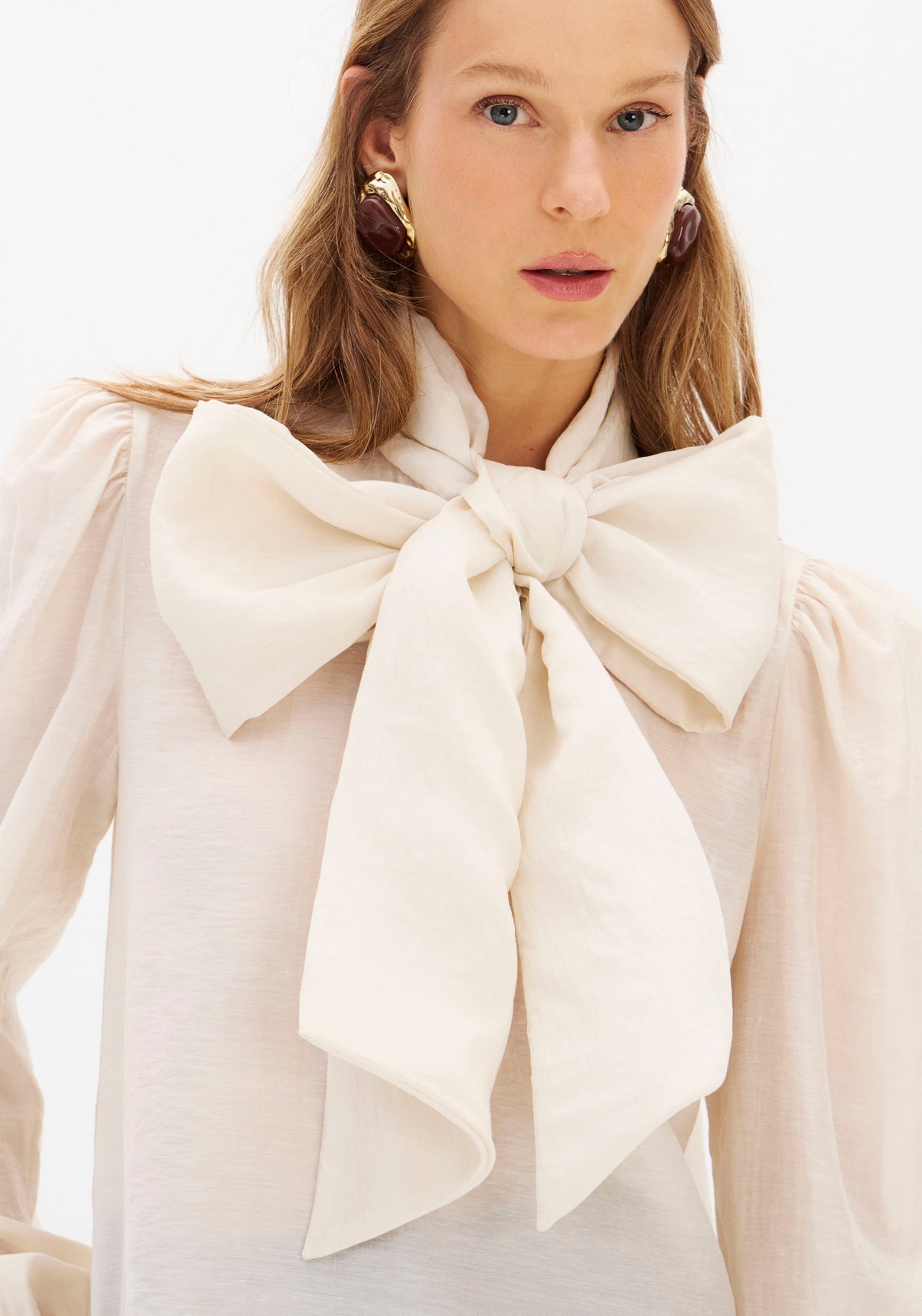 Blusa com Laço Lança Perfume